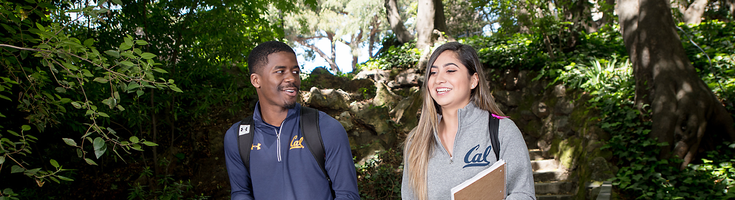 Two students walking through Berkeley campus