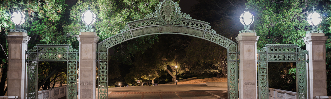 Sather Gate at night.